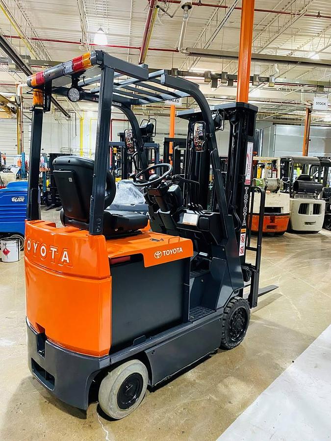 Toyota 7FBCU15 – rear angle view – counterweight, overhead guard, and operator seat – CSA/MOL certified electric forklift – Brampton ON