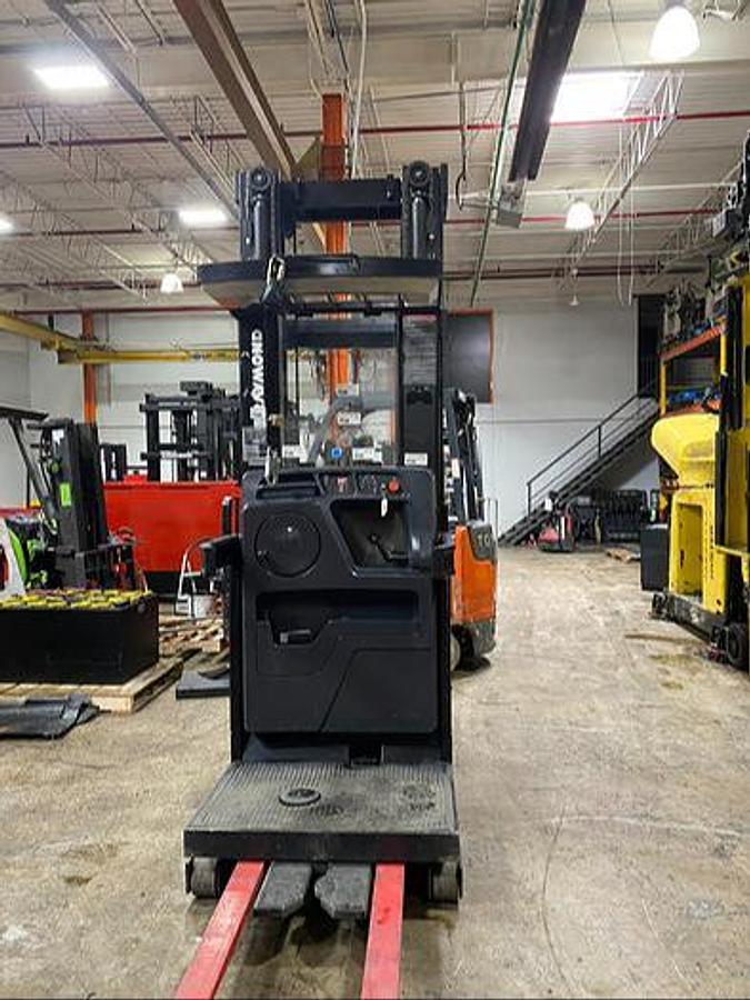 alt="2017 Raymond 540-OPC30TT CSA Certified Electric Order Picker front view, 3,000 lb capacity"