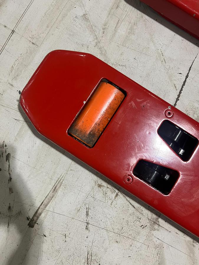 Right-side poly load wheel on Budget Raymond 8400 walkie pallet jack, older