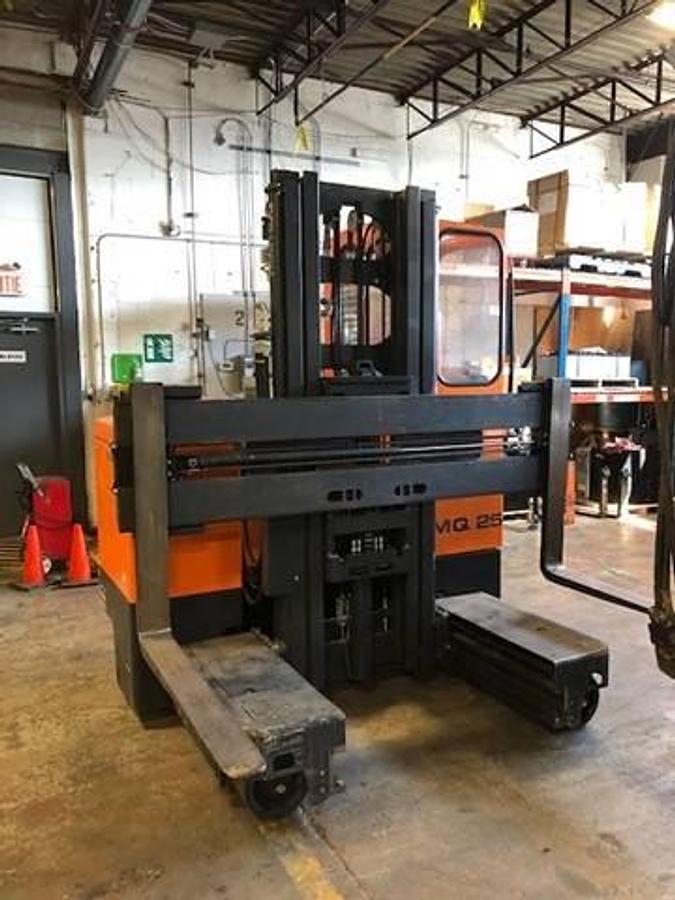 Front angled view showing mast rails and sideloading fork carriage