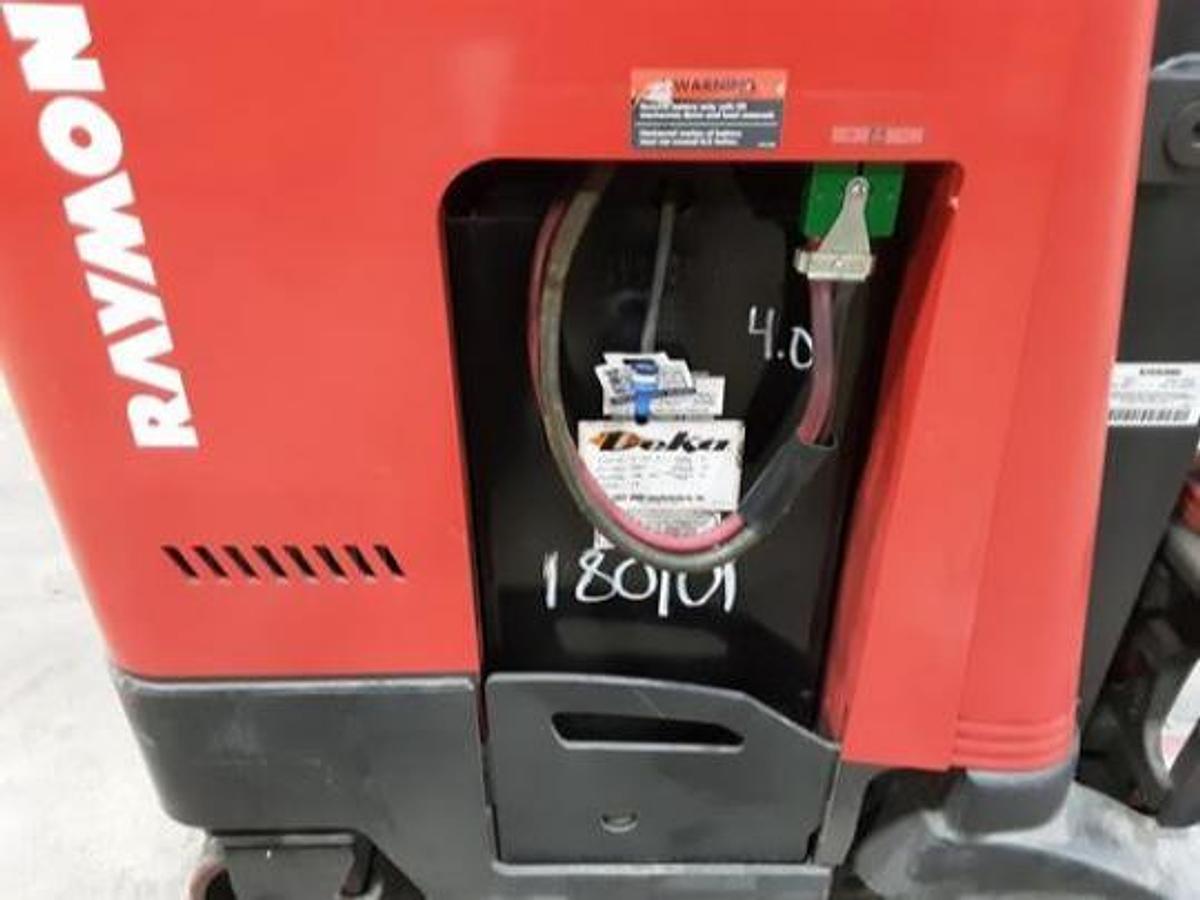 Opposite side of battery compartment and battery