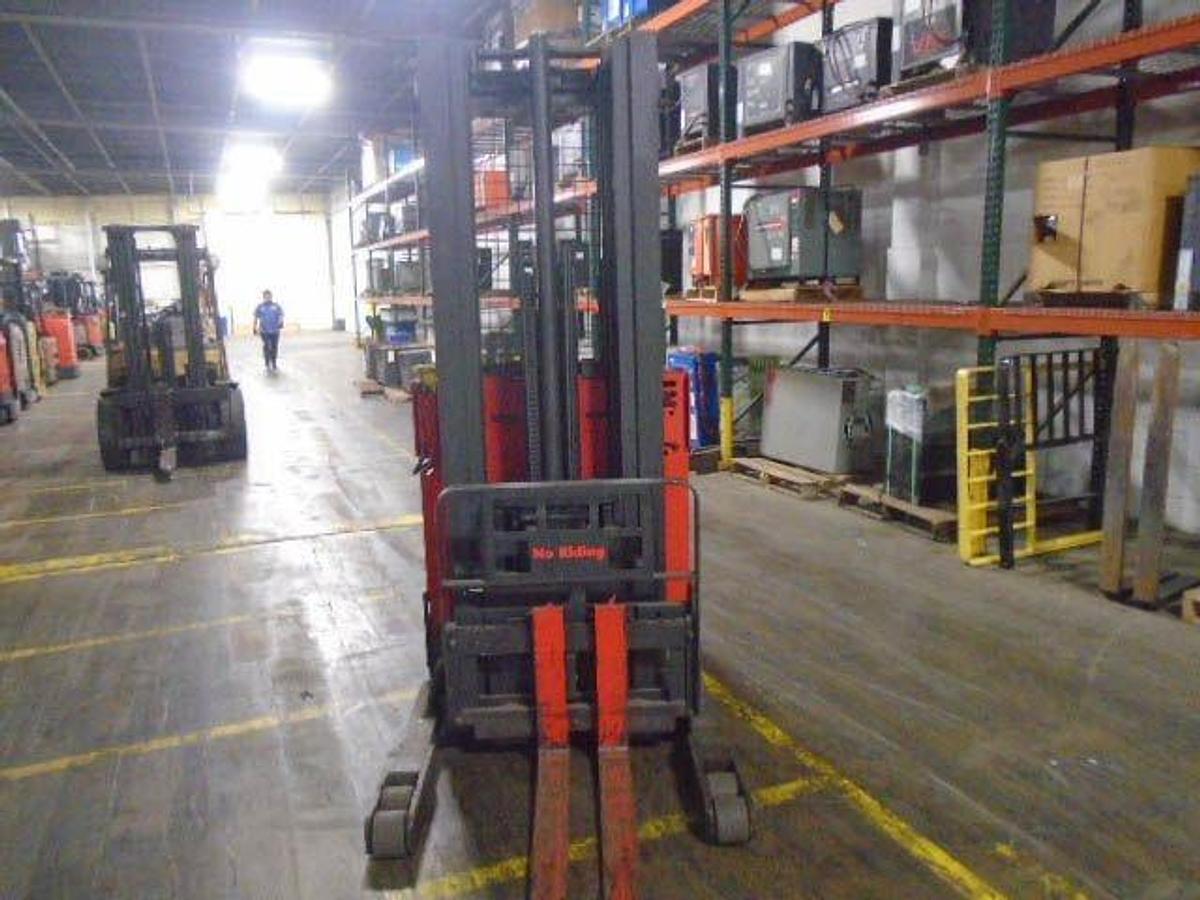 Front view of refurbished 1998 Raymond EASIR40TT electric reach truck showing mast, forks, reach carriage, and platform base during Mississauga deployment