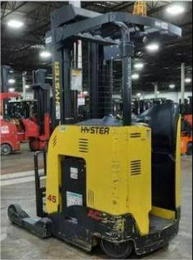 Rear opposite side view of refurbished 2018 Hyster N45ZR2 electric reach truck showing counterweight, operator compartment, 224" mast, 42" forks with load backrest, cushion tires, and CSA certification decal during Ontario deployment.