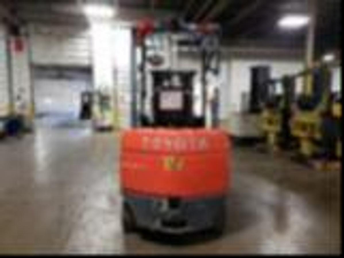 Back view of 2019 Toyota 7FBCU35 electric forklift – CSA-certified 8,000 lb chassis with rear counterweight, overhead guard, and cushion tires shown reconditioned with used battery option available or new 36V battery upgrade in Brampton ON – Premier Lift Equipment