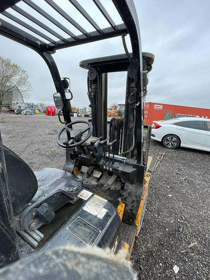 Rear view of Hangcha CPQD25N operator compartment showing ergonomic seat, steering column, and overhead guard – CSA certified forklift