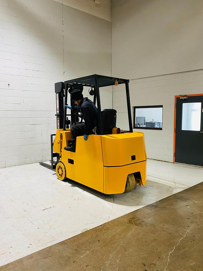 Drexel SLT22 – rear angle with operator seated – harness points, control panel, CSA-certified man-down swing mast forklift – Brampton ON
