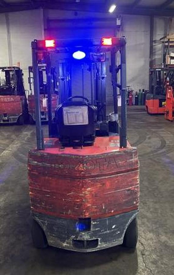 Back view of 2019 Toyota 7FBCU35 electric forklift – CSA-certified 8,000 lb 4-wheel chassis with 187” triple mast, clamp-ready 4-way hydraulics, and cushion tires shown reconditioned with used 36V battery option available in Brampton ON – Premier Lift Equipment