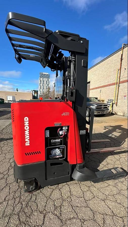 Refurbished 2015 Raymond 750-R35TT electric reach truck with CSA certification and new paint deployed in Mississauga for narrow aisle warehouse operations