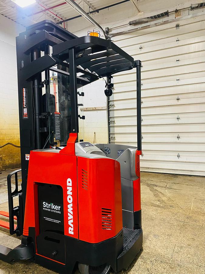 Rear chassis of Raymond 740-DR32TT showing 36V battery compartment and baseleg openin