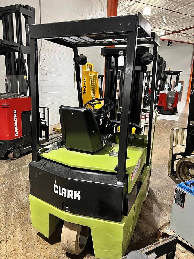Rear counterweight view of Clark TM15S electric sit-down forklift showing branded counterweight, cushion tires, and CSA-certified chassis – unit staged in Brampton ON