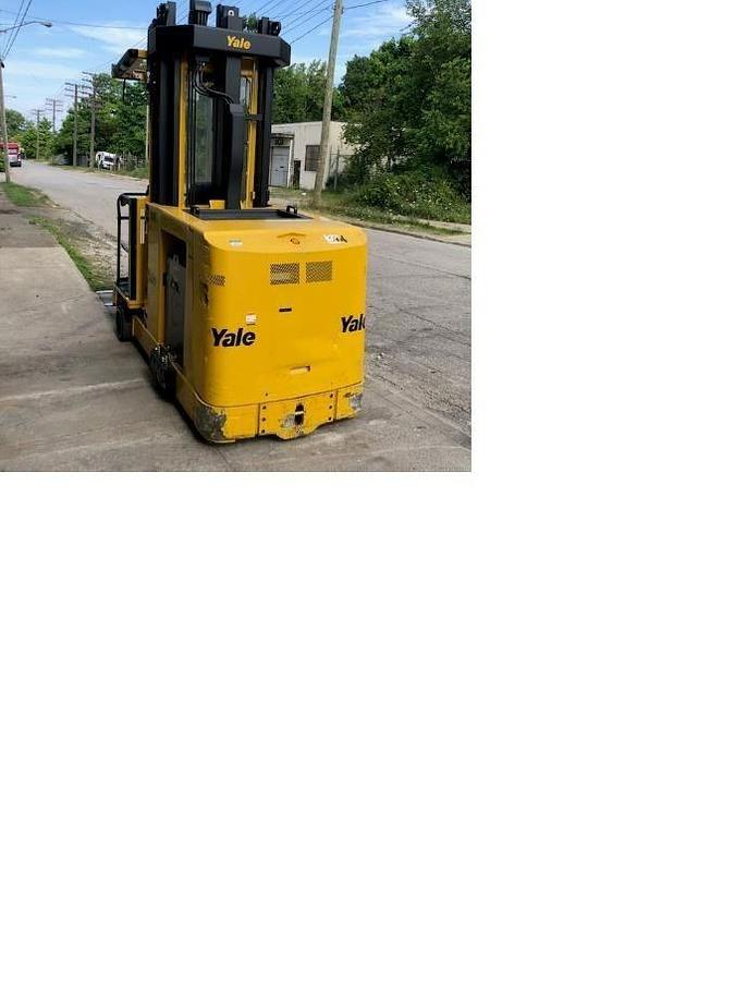 Back view of refurbished 2013 Yale NTA030SB electric man‑up swing reach turret truck showing rear tires, counterweight, and CSA certification decal during Ontario deployment.