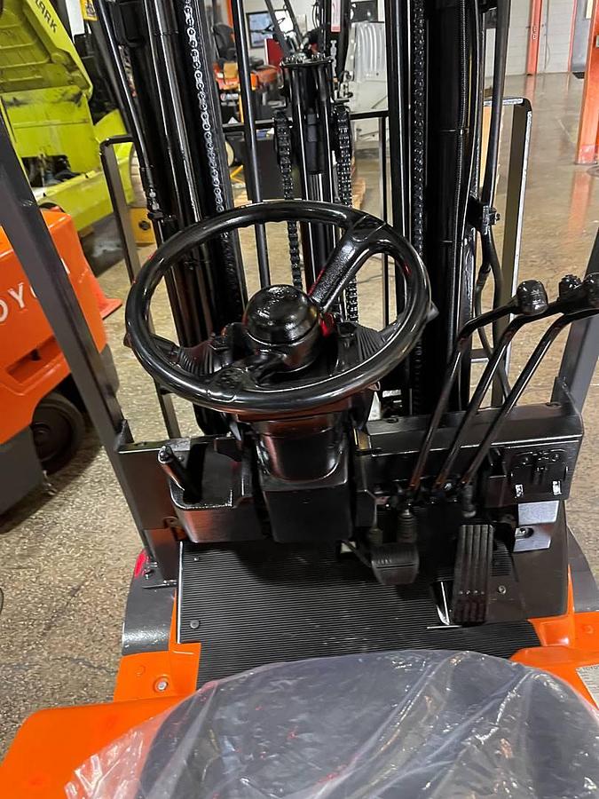Toyota 7FBEU20 – operator station view – ergonomic seat, OPSS system, and hydrostatic steering – CSA/MOL certified electric forklift – Brampton ON