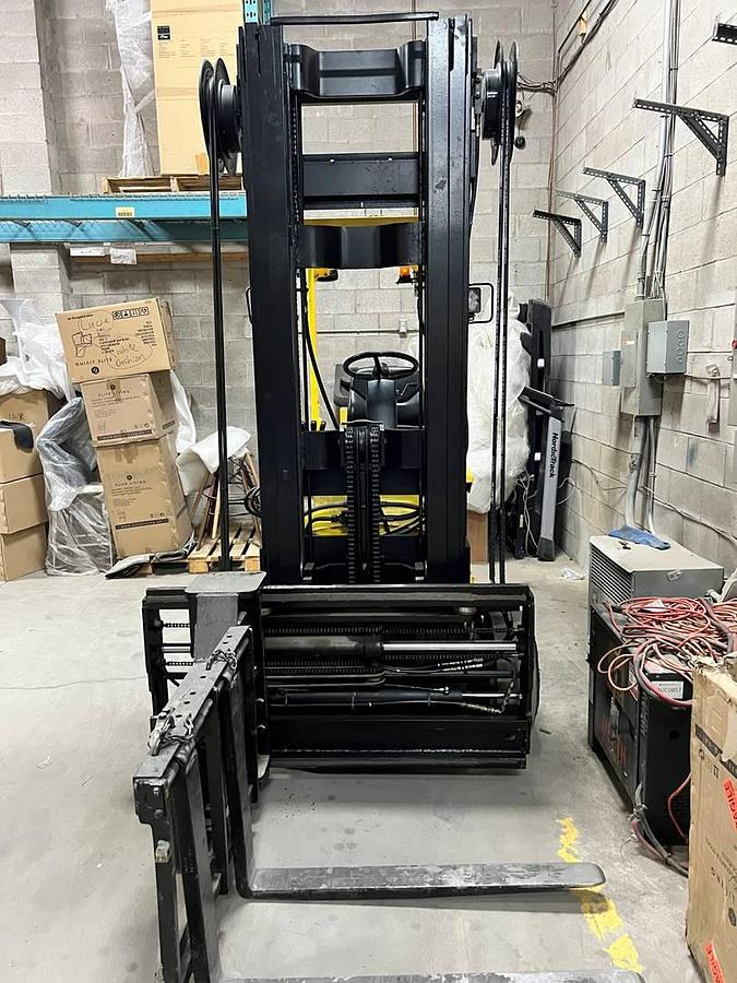 Front view of refurbished Hyster N30XMH electric man‑down turret truck showing Superior Swing Mast, turret carriage, and CSA certification decal during Ontario deployment.