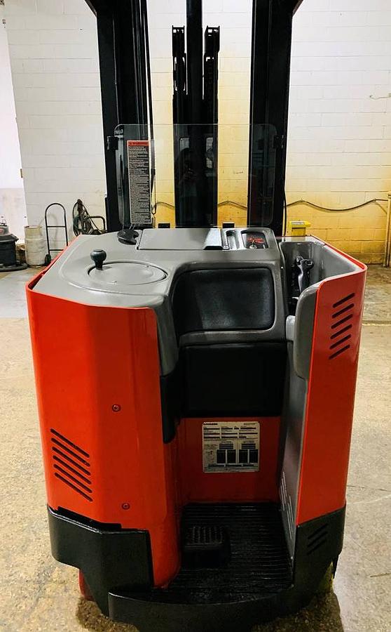 Operator compartment view showing stand-up controls and side-stance layout