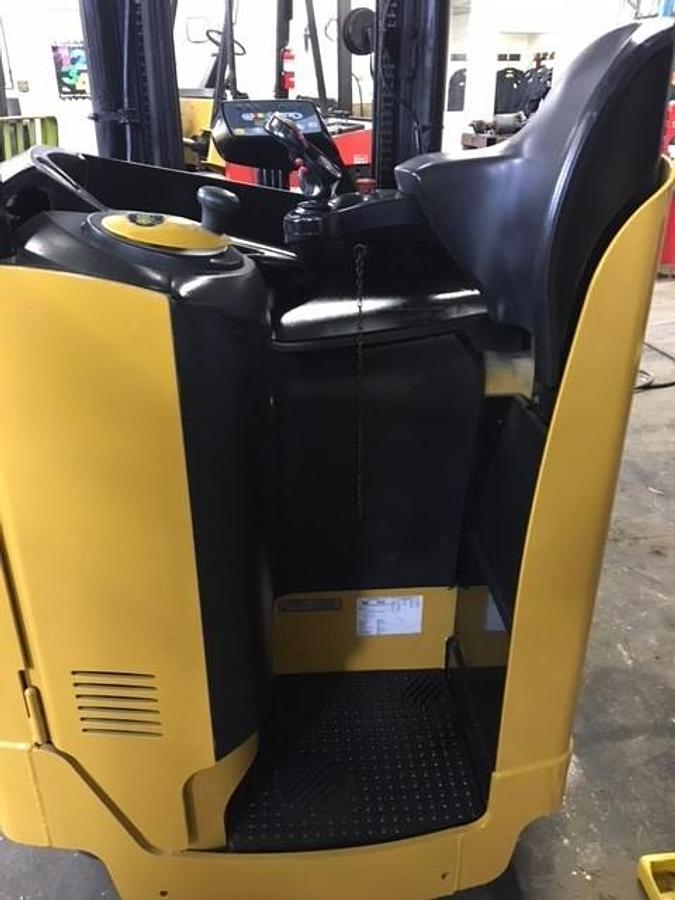 NR040DANS24TE091 reach truck showing steering wheel, levers, and CSA compliance decal during Brampton deployment