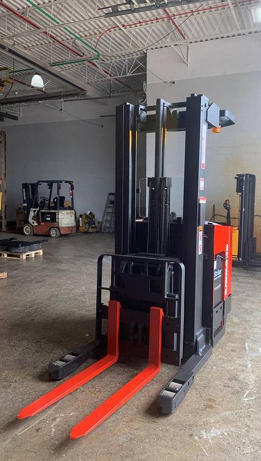 Front view of Budget Raymond EASIDR25TT deep‑reach forklift, older non‑CSA unit.