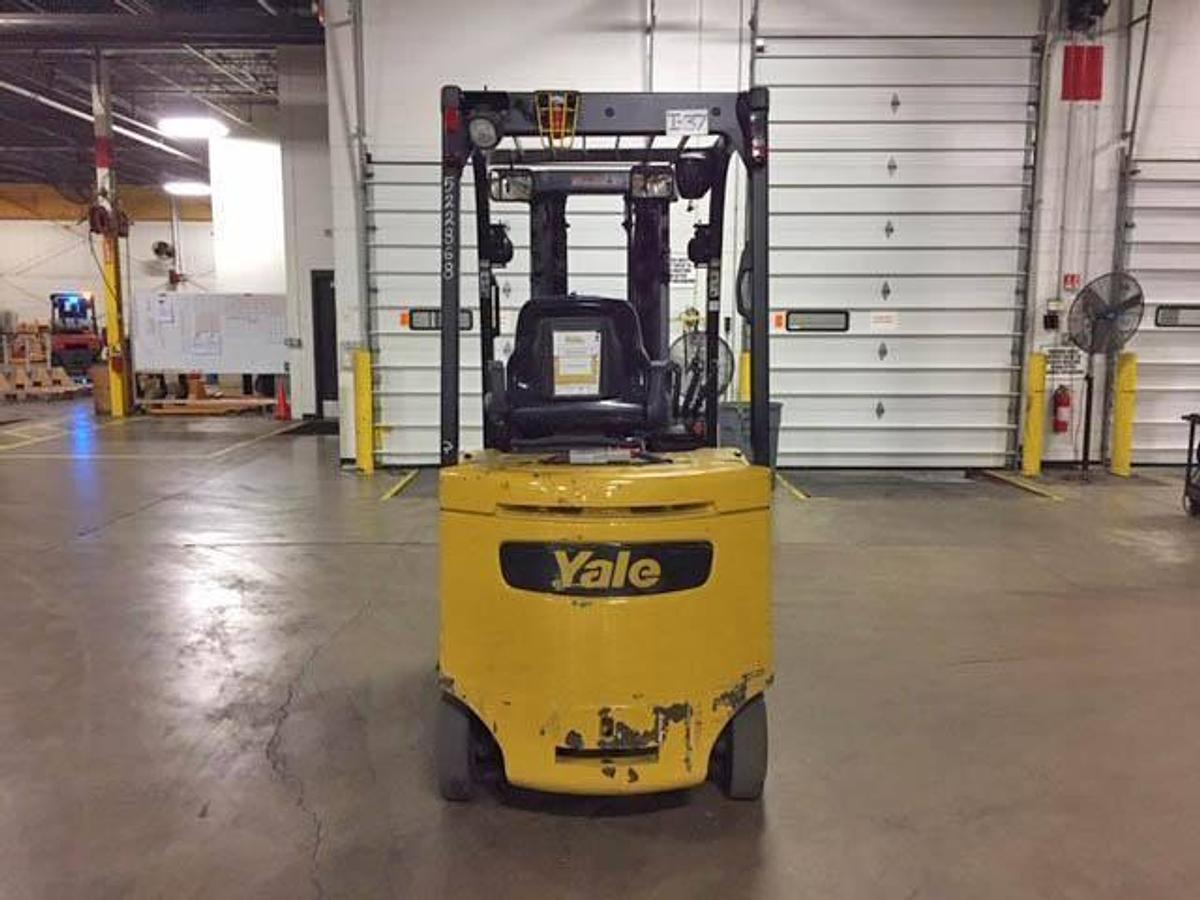Back view of refurbished 2016 Yale ERC050VGN electric forklift showing counterweight, battery compartment, and CSA inspection tag during Brampton deployment