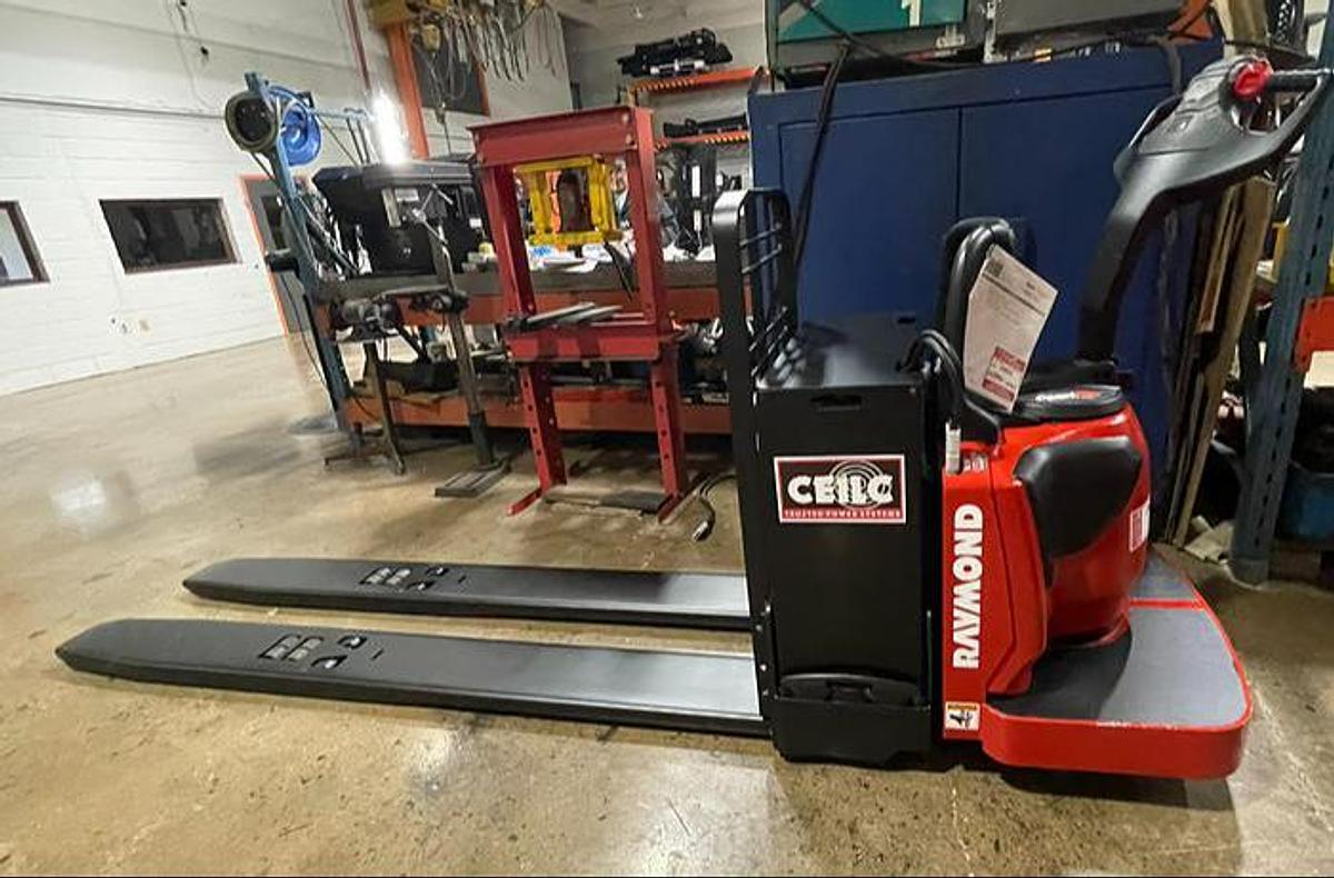 2015 Raymond 8410 CSA electric rider pallet jack Brampton 6000 lb 27x96 long forks battery charger included export certified freezer compatible