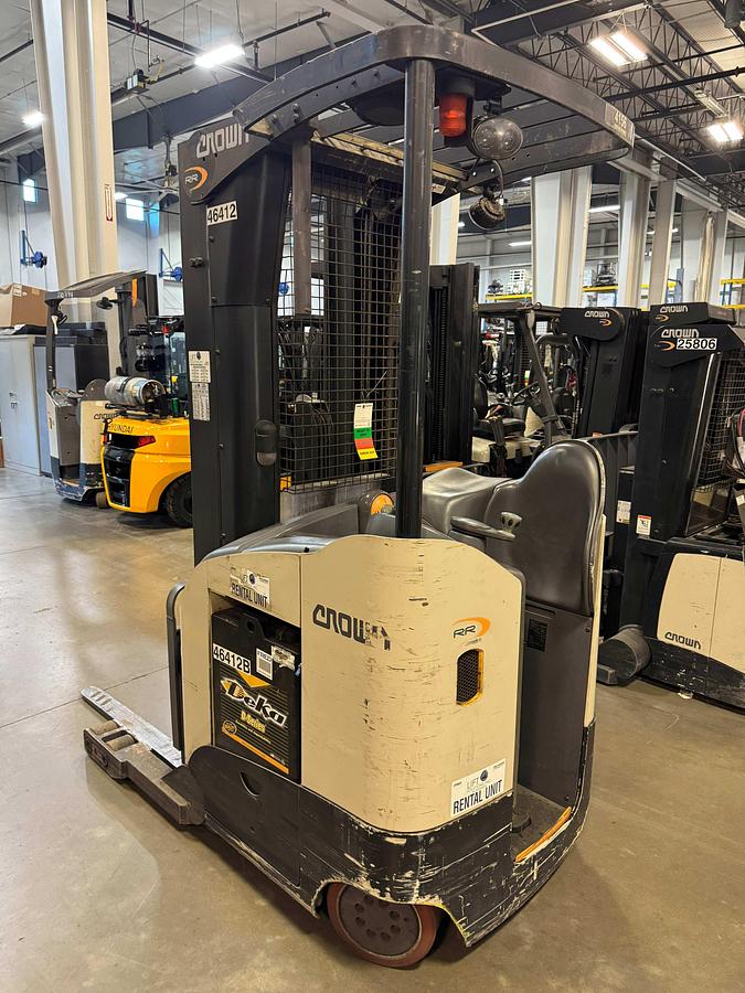 Rear angle view of Crown RR5725-45 reach truck – CSA-certified 4,500 lb electric unit with operator side stance, load backrest, and cushion tires for indoor rack storage – Premier Lift Equipment Brampton ON