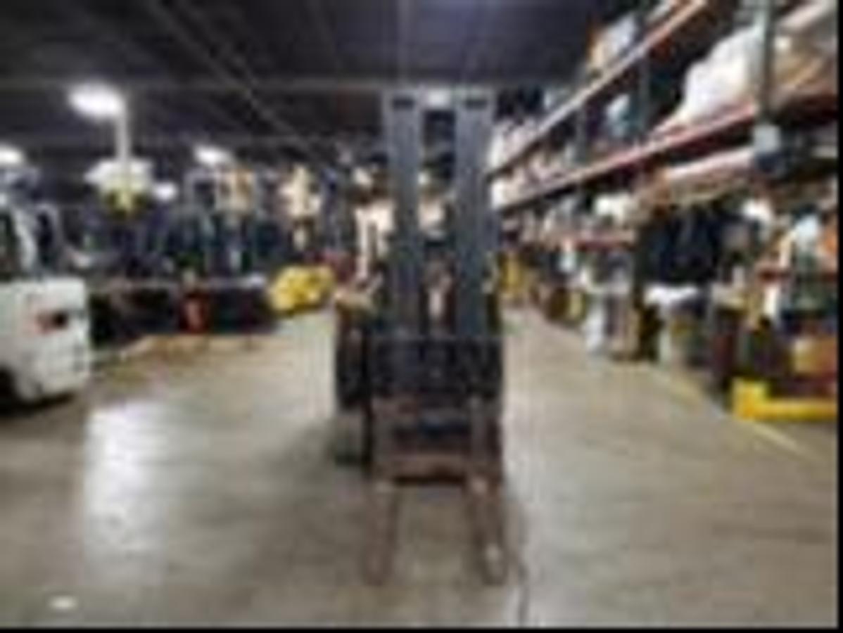 Drexel SLT35AC – front view – quad mast, swing turret, side shift forks – CSA electric forklift – very narrow aisle – Brampton ON