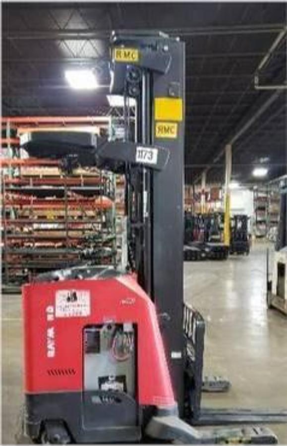 Refurbished 2015 Raymond 740-45TT electric reach truck with CSA certification and new paint deployed in Mississauga for narrow aisle warehouse operations