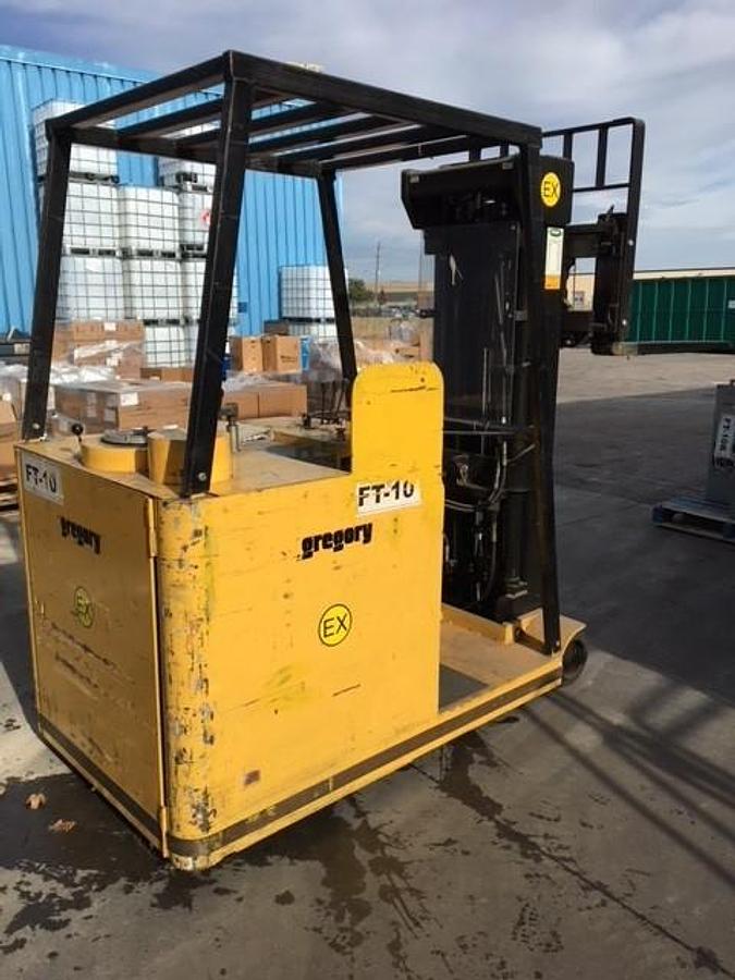 Opposite side view of refurbished 2008 Gregory RC4EX EX rated explosion‑proof dockstocker showing operator compartment, mast, and CSA certification decal during Brampton deployment.