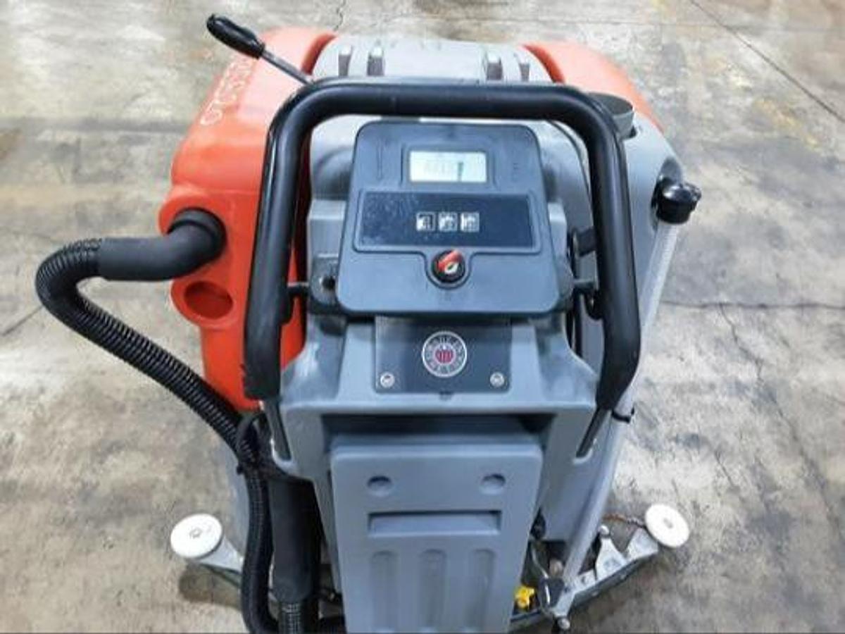 Rear perspective of 2023 PowerBoss Phoenix 26 floor scrubber highlighting ergonomic steering handles and controls