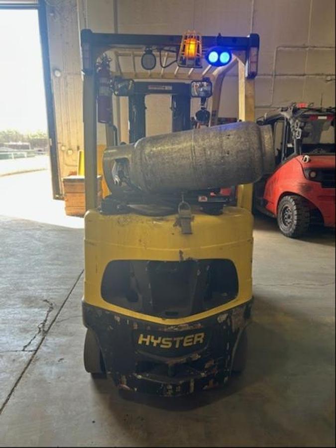 Rear view of 2017 Hyster S50FT LPG forklift – CSA-certified 5,000 lb chassis with rear counterweight, propane bracket mount, and cushion tire layout shown refurbished and sold without tank, upgrade option available – Brampton ON – Premier Lift Equipment