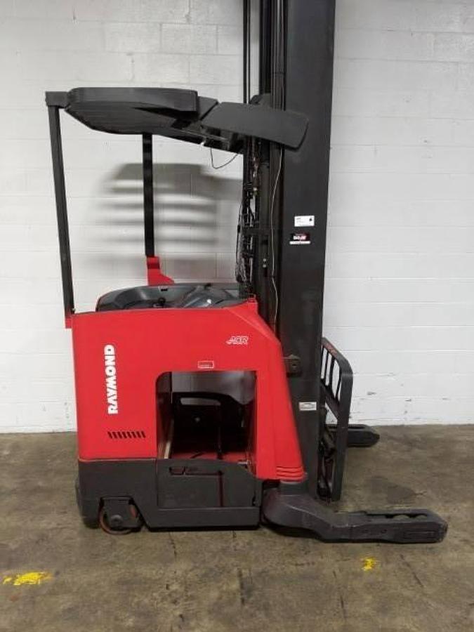Refurbished 2015 Raymond 750-R45TT electric reach truck with CSA certification and new paint deployed in Mississauga for narrow aisle warehouse operations