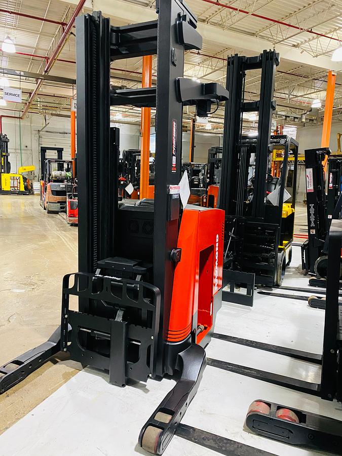 Front angled view showing mast rails and compact chassis profile