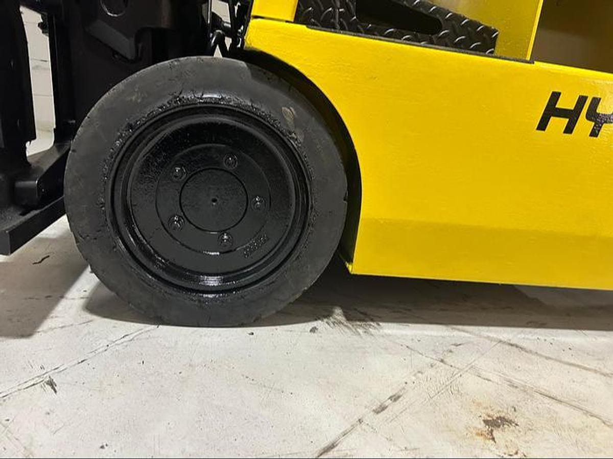 Left drive tire of Budget Hyster J30XMT older electric forklift, non‑CSA