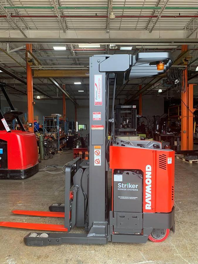 Budget Raymond EASIDR25TT deep‑reach forklift, older non‑CSA unit, 2,500 lb, 205” mast.