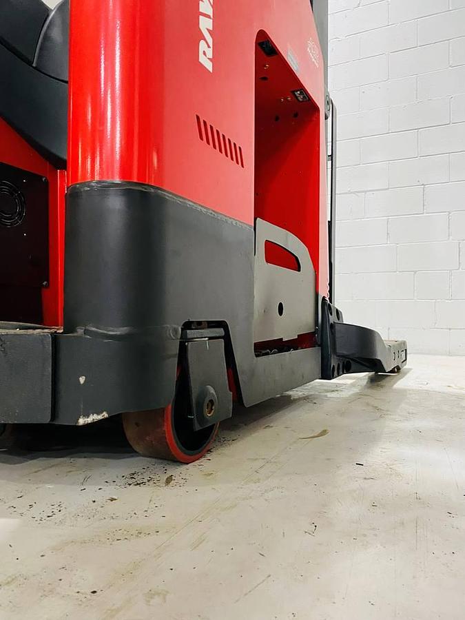 Close-up of rear caster wheel on 2022 Raymond 752-R45TT freezer reach truck showing poly tread finish, CSA certification decal, and chassis detail – unit staged in Brampton ON