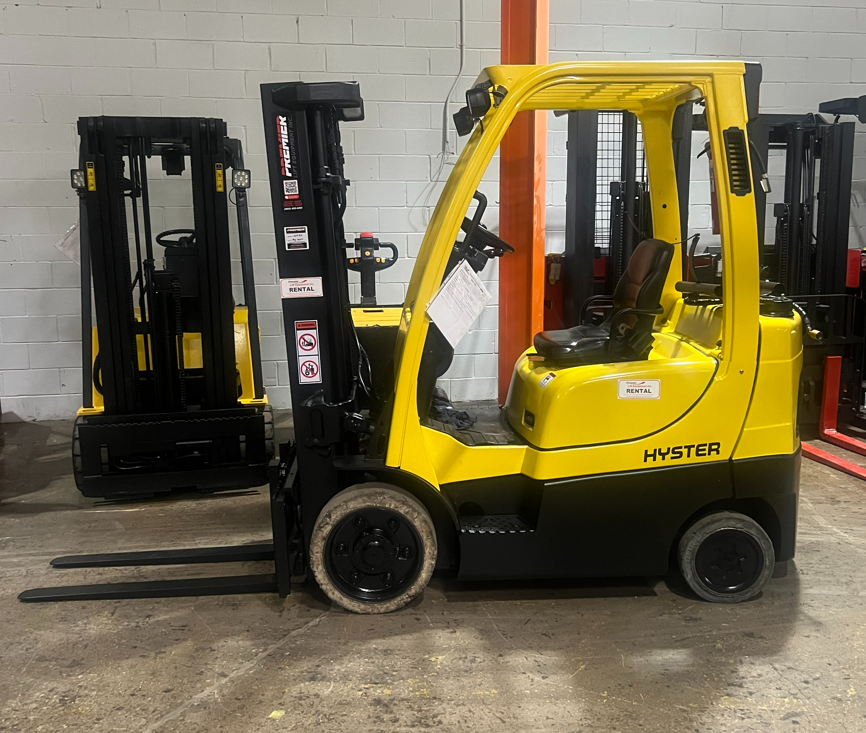 Budget Hyster S50FT propane cushion forklift, non‑CSA indoor unit, 5,000 lb capacity, 189″ triple mast.