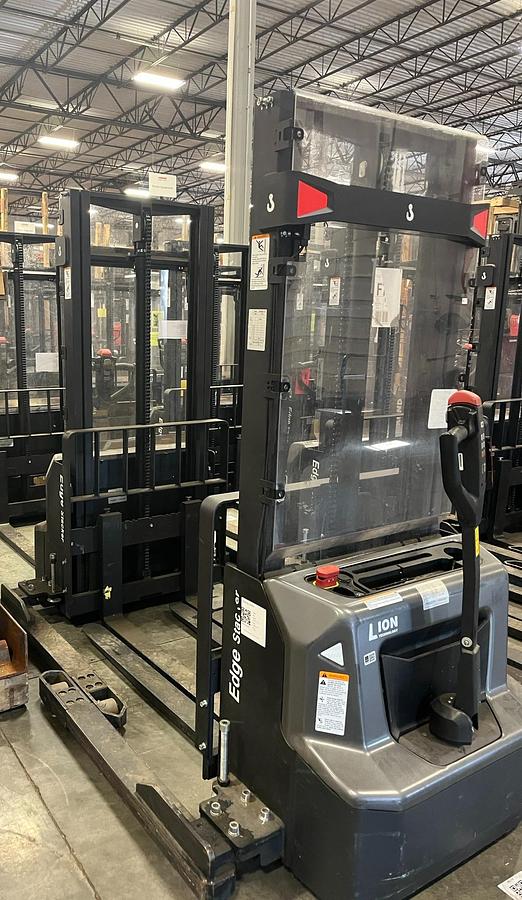 2022 Edge PSE26NSL 112 G walkie straddle stacker rear side angle showing adjustable baselegs and 112 inch mast