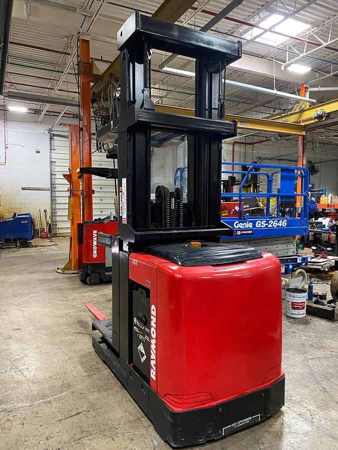 alt="2014 Raymond 560-OPC30TT CSA Certified Electric Order Picker rear angled view, 118 inch collapsed mast"