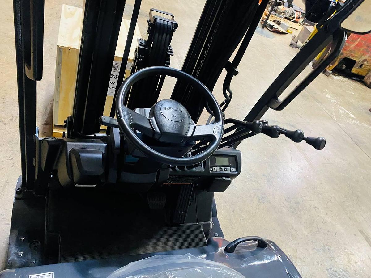 Operator compartment view showing suspension seat and intuitive controls