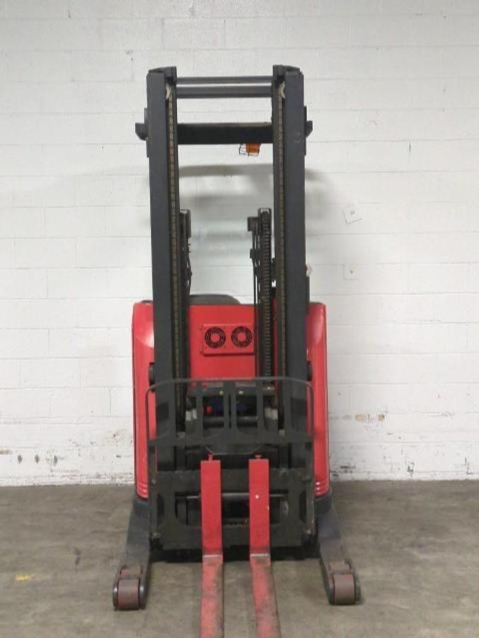 Front angled view showing mast rails and 42” fork tips