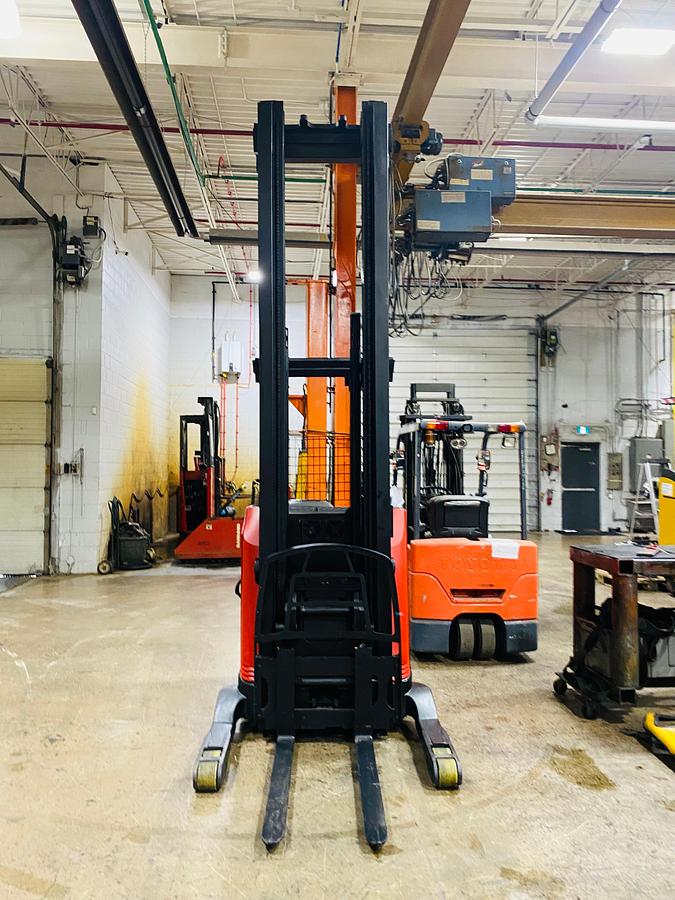 Front angled view showing mast rails and compact chassis profile