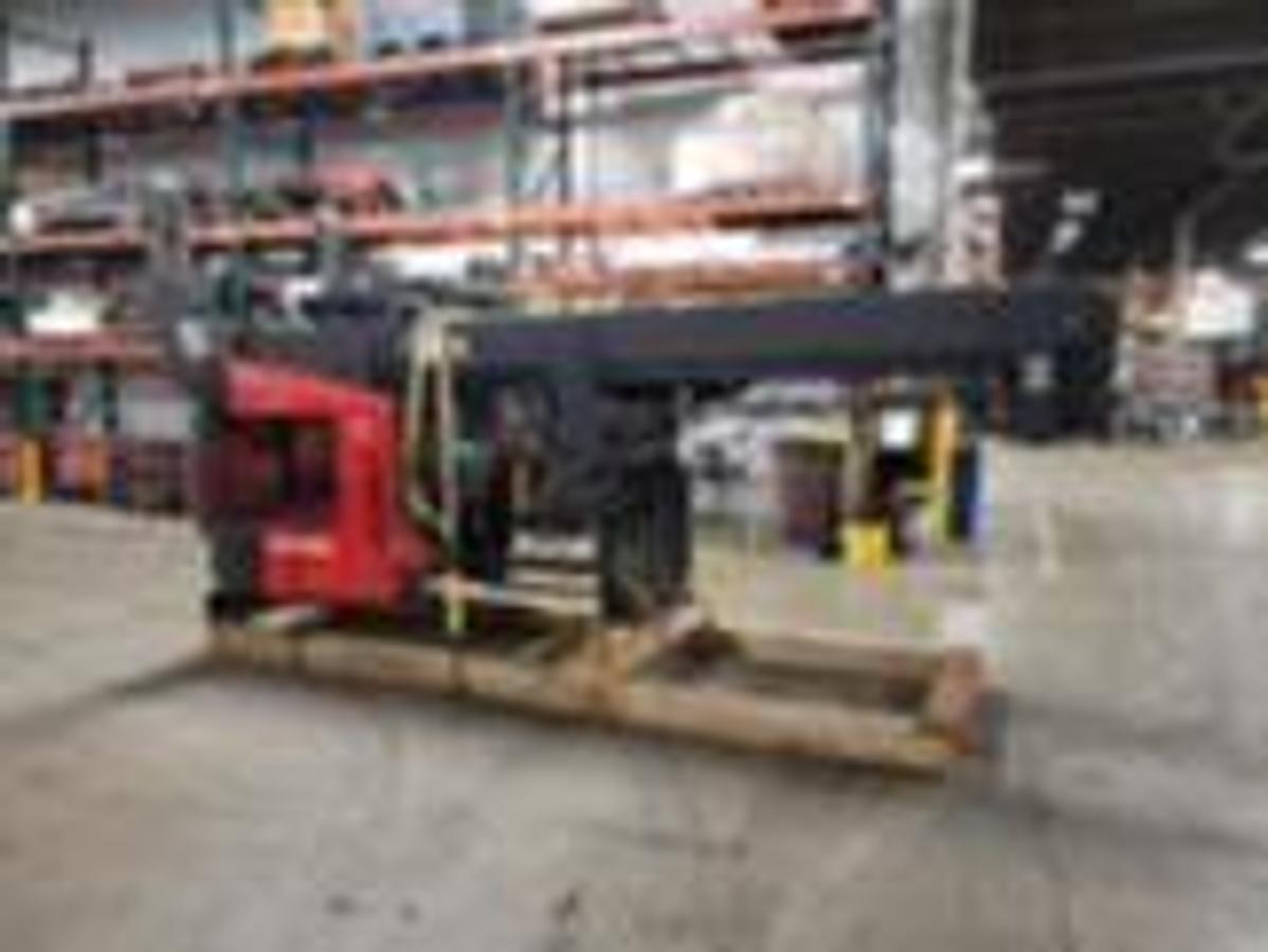 Opposite Cradled Side view of CSA-certified Raymond 752-R45TT reach truck with triple mast and poly tires – staged in Brampton ON