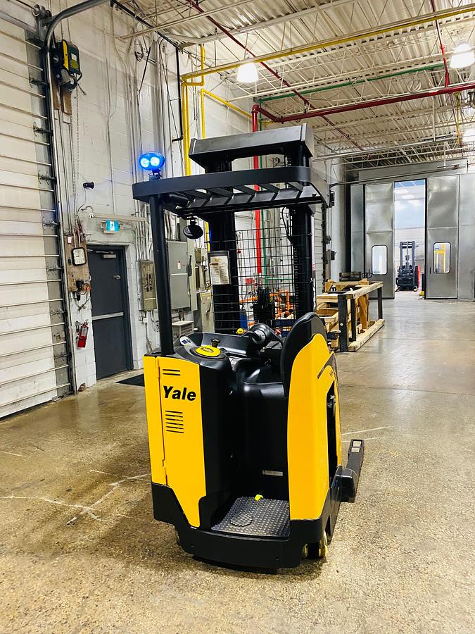 Rear view showing counterweight and mounted safety lighting