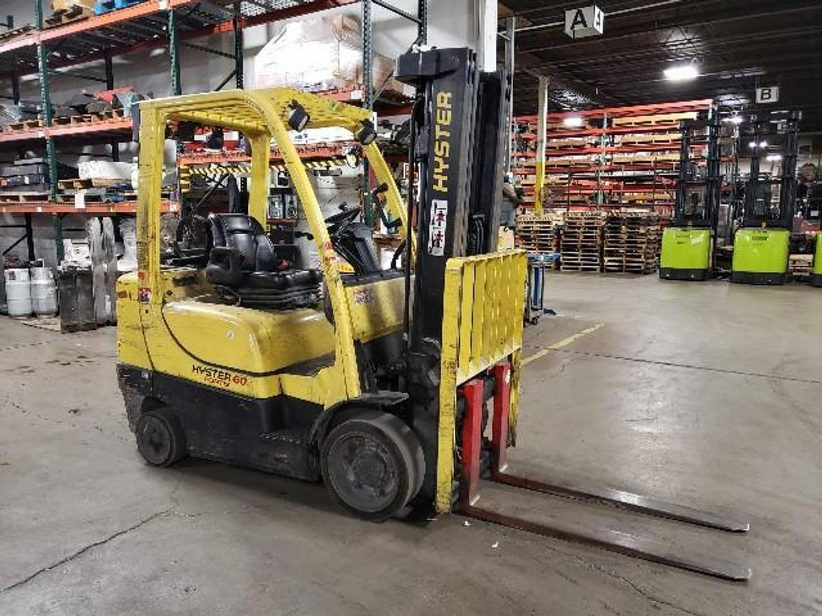 “Opposite side view of 2010 Hyster S60FT – 6,000 lb CSA‑Certified LPG Cushion Forklift with Quad Mast”