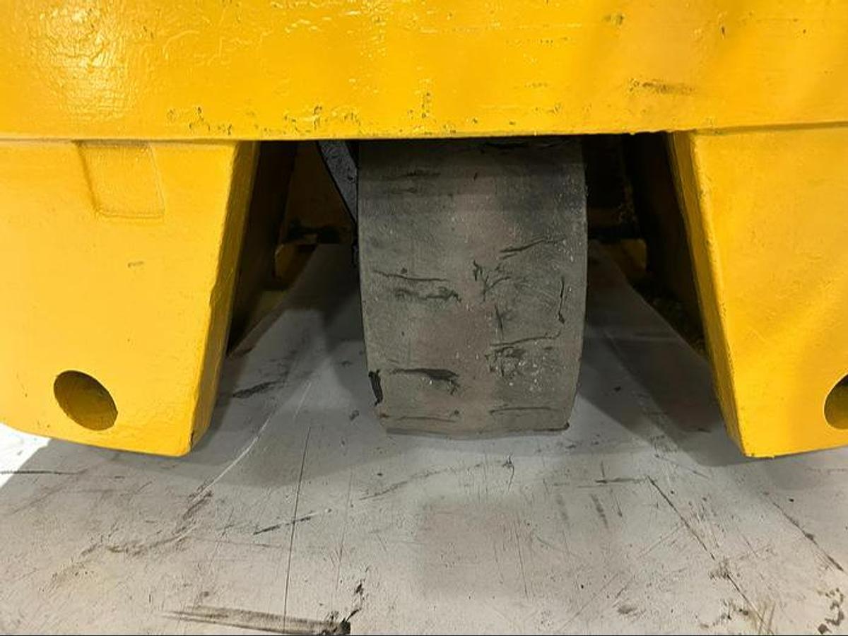 “Rear tire of Budget Caterpillar FC40 older electric forklift, non‑CSA.