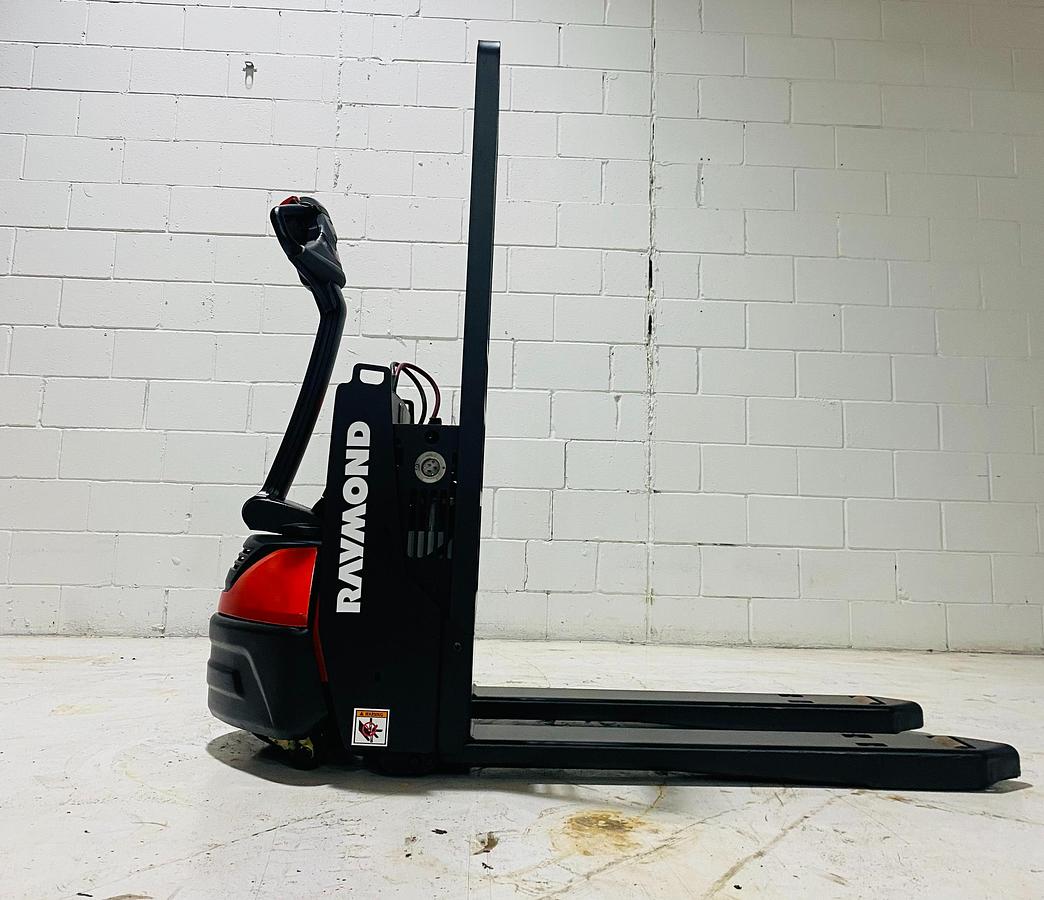 2020 Raymond 8210 walkie pallet jack with rare 27x34 short forks, refurbished and safety‑checked.