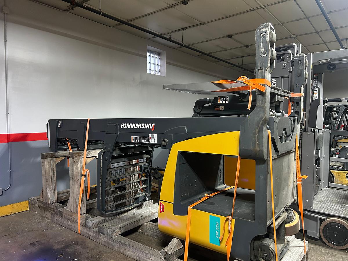 angled side vies of machine laid down and cradled