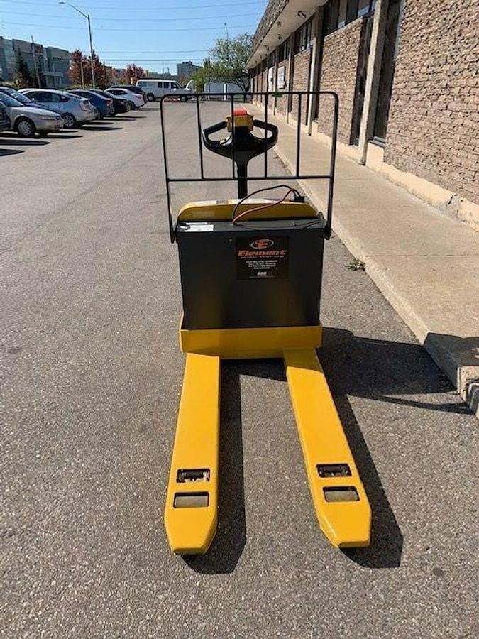 Front view of refurbished 2010 Yale MPB040 electric walkie pallet jack showing fork carriage, tips, and CSA certification decal during Ontario deployment