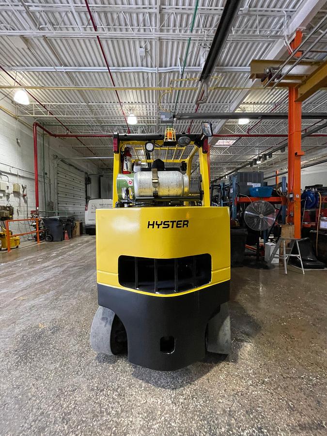 Rear view showing counterweight and mounted safety lighting