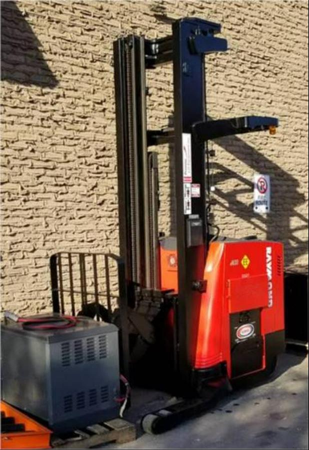 Refurbished EE-rated 2016 Raymond 750-R45TT electric reach truck with CSA certification and new paint deployed in Mississauga for narrow aisle warehouse operations
