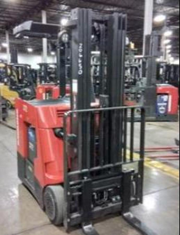 Front angle view of Raymond 425-C35TT electric stand-up counterbalance forklift with battery installed – CSA-certified 3,500 lb chassis showing mast, forks, and overhead guard staged in Brampton ON – Premier Lift Equipment