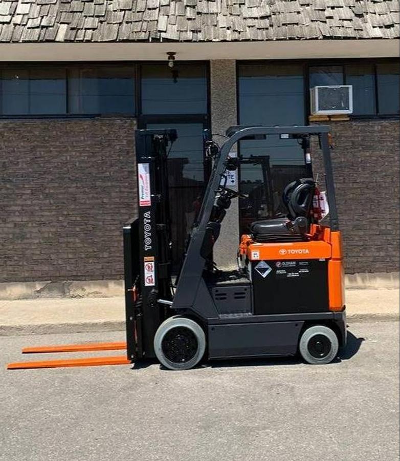 Opposite side view of Toyota 7FBCU15 showing compact chassis, cushion tires, and operator seat – CSA certified electric forklift for indoor use